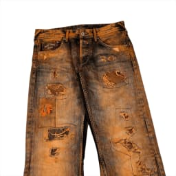 DISTRESSED RUSTY JEANS 