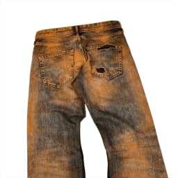 DISTRESSED RUSTY JEANS 